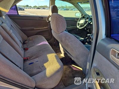 Zdjęcie 10 z 13 samochodu: 2003 TOYOTA CAMRY LE VIN:4T1BE32K13U188286 - miniatura
