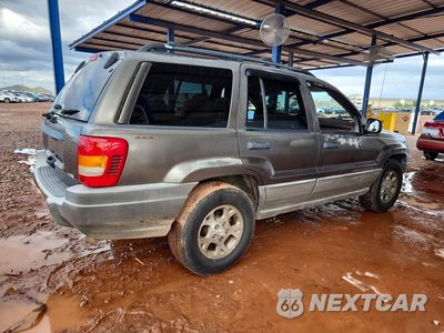 Trzecie zdjęcie samochodu z tyłu: 2000 JEEP GRAND CHEROKEE LAREDO VIN:1J4GW48N0YC241940 - miniatura