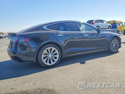 Trzecie zdjęcie samochodu z tyłu: 2016 TESLA MODEL S VIN:5YJSA1E15GF142479 - miniatura