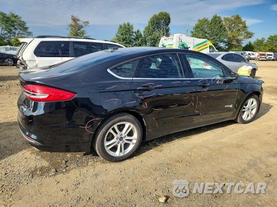 Trzecie zdjęcie samochodu z tyłu: 2018 FORD FUSION SE HYBRID VIN:3FA6P0LU8JR133990 - miniatura