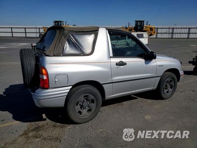 Trzecie zdjęcie samochodu z tyłu: 2001 SUZUKI VITARA JLS VIN:2S3TC52CX16102652 - miniatura