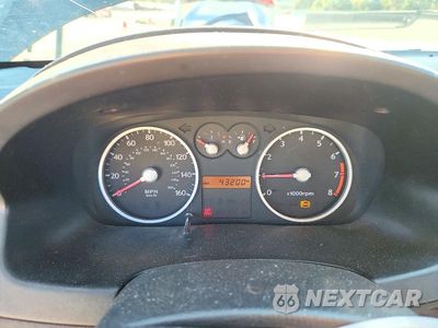 Zdjęcie 9 z 12 samochodu: 2004 HYUNDAI TIBURON GT VIN:KMHHN65FX4U118474 - miniatura