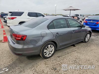 Trzecie zdjęcie samochodu z tyłu: 2016 VOLKSWAGEN JETTA SE VIN:3VWD67AJ1GM324272 - miniatura