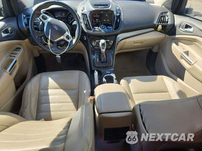 Zdjęcie 8 z 13 samochodu: 2014 FORD ESCAPE TITANIUM VIN:1FMCU0JX4EUE36925 - miniatura