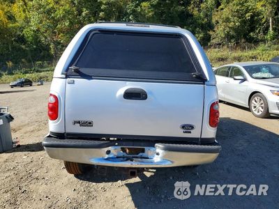 Zdjęcie 6 z 12 samochodu: 2001 FORD F150 SUPERCREW VIN:1FTRW08L51KE21433 - miniatura