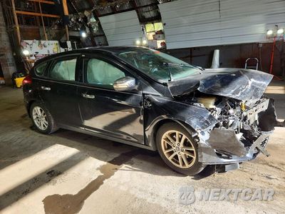 Czwarte zdjęcie samochodu z boku: 2016 FORD FOCUS SE VIN:1FADP3K21GL294097 - miniatura