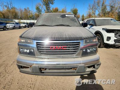 Piąte zdjęcie samochodu w środku: 2011 GMC CANYON SLE VIN:1GTH6MFE7B8125884 - miniatura