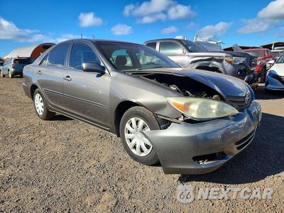 Czwarte zdjęcie samochodu z boku: 2004 TOYOTA CAMRY STANDARD VIN:JTDBE32K840280959 - miniatura