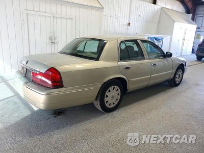 Trzecie zdjęcie samochodu z tyłu: 2004 MERCURY GRAND MARQUIS GS VIN:2MEFM74WX4X687306 - miniatura