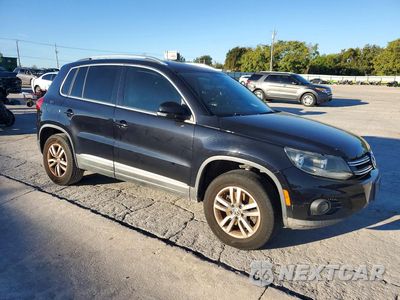 Czwarte zdjęcie samochodu z boku: 2012 VOLKSWAGEN TIGUAN S VIN:WVGAV7AX5CW518550 - miniatura