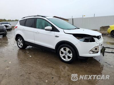 Czwarte zdjęcie samochodu z boku: 2015 FORD ESCAPE SE VIN:1FMCU0G9XFUB77996 - miniatura