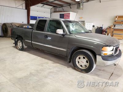 Czwarte zdjęcie samochodu z boku: 2001 GMC NEW SIERRA C1500 VIN:2GTEC19T811144997 - miniatura