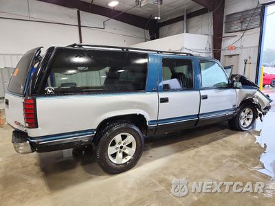 Trzecie zdjęcie samochodu z tyłu: 1994 GMC SUBURBAN C1500 VIN:1GKEC16K9RJ754098 - miniatura