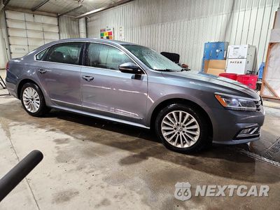 Czwarte zdjęcie samochodu z boku: 2016 VOLKSWAGEN PASSAT SE VIN:1VWBS7A36GC055725 - miniatura