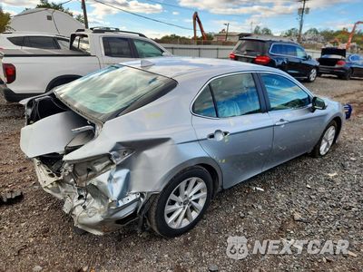 Trzecie zdjęcie samochodu z tyłu: 2022 TOYOTA CAMRY LE VIN:4T1C11AK0NU637482 - miniatura