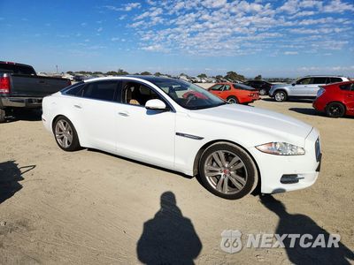 Czwarte zdjęcie samochodu z boku: 2014 JAGUAR XJL PORTFOLIO VIN:SAJWA2GZ5E8V65264 - miniatura