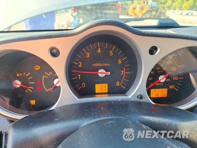 Zdjęcie 9 z 12 samochodu: 2004 NISSAN 350Z BASE VIN:JN1AZ34D54T160911 - miniatura