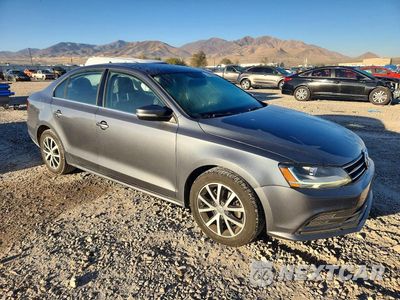 Czwarte zdjęcie samochodu z boku: 2017 VOLKSWAGEN JETTA SE VIN:3VWDB7AJ6HM231695 - miniatura