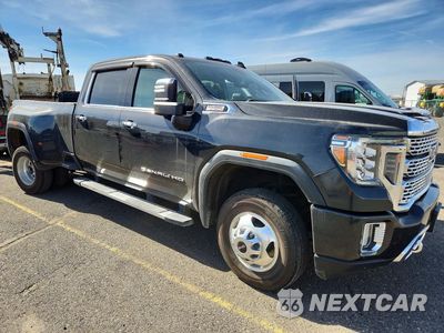 Czwarte zdjęcie samochodu z boku: 2020 GMC SIERRA K3500 DENALI VIN:1GT49WEY1LF276729 - miniatura