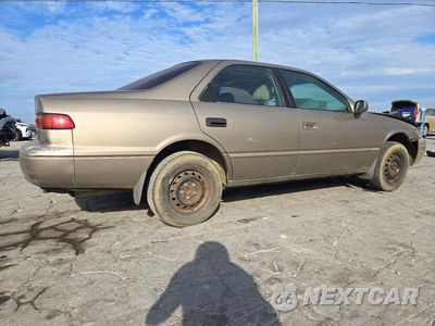 Trzecie zdjęcie samochodu z tyłu: 1999 TOYOTA CAMRY CE VIN:4T1BG22K3XU565064 - miniatura