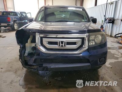 Piąte zdjęcie samochodu w środku: 2011 HONDA PILOT LX VIN:5FNYF4H2XBB089207 - miniatura