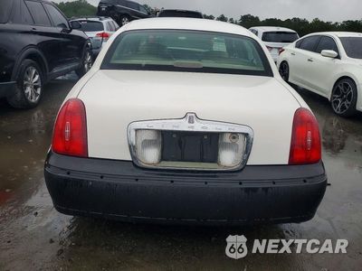 Zdjęcie 6 z 12 samochodu: 2000 LINCOLN TOWN CAR EXECUTIVE VIN:1LNHM81W9YY869911 - miniatura