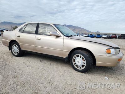 Czwarte zdjęcie samochodu z boku: 1995 TOYOTA CAMRY LE VIN:4T1GK12E9SU101567 - miniatura