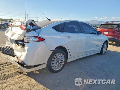 Trzecie zdjęcie samochodu z tyłu: 2014 FORD FUSION SE HYBRID VIN:3FA6P0LU1ER104045 - miniatura