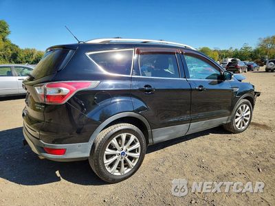 Trzecie zdjęcie samochodu z tyłu: 2017 FORD ESCAPE TITANIUM VIN:1FMCU9J98HUA07135 - miniatura