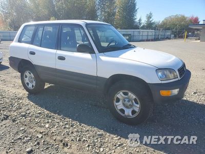Czwarte zdjęcie samochodu z boku: 1999 TOYOTA RAV4 BASE VIN:JT3GP10V8X0035847 - miniatura