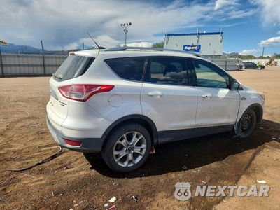 Trzecie zdjęcie samochodu z tyłu: 2014 FORD ESCAPE TITANIUM VIN:1FMCU9JX3EUE19649 - miniatura