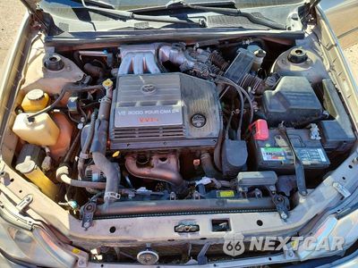 Zdjęcie 11 z 12 samochodu: 2000 TOYOTA AVALON XL VIN:4T1BF28B4YU036489 - miniatura