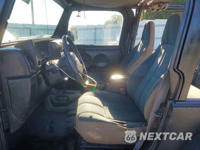 Zdjęcie 7 z 12 samochodu: 2000 JEEP WRANGLER / TJ SAHARA VIN:1J4FA59S4YP802394 - miniatura
