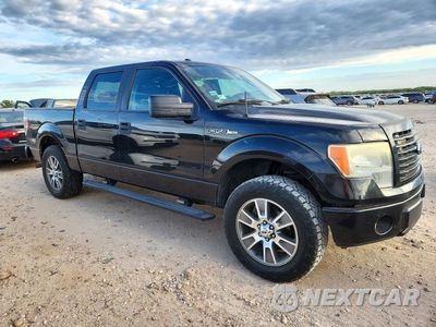 Czwarte zdjęcie samochodu z boku: 2014 FORD F150 SUPERCREW VIN:1FTEW1CM0EKG31321 - miniatura