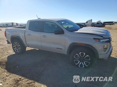 Czwarte zdjęcie samochodu z boku: 2026 GMC CANYON AT4 VIN:1GTP2DEK8T1168719 - miniatura