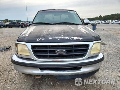 Piąte zdjęcie samochodu w środku: 1997 FORD F150 VIN:1FTDX1760VNC06071 - miniatura