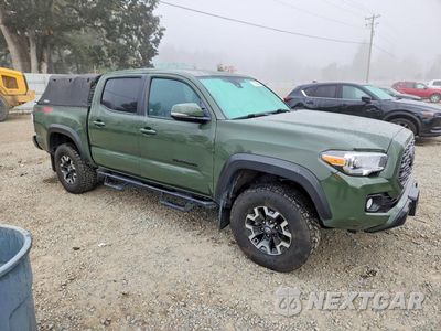 Czwarte zdjęcie samochodu z boku: 2022 TOYOTA TACOMA TRD OFF-ROAD VIN:3TMCZ5ANXNM508989 - miniatura