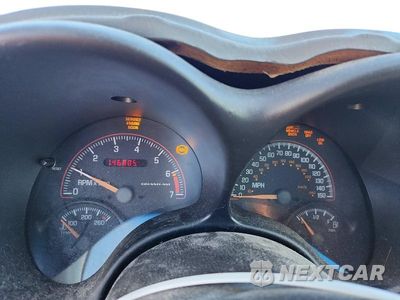 Zdjęcie 9 z 12 samochodu: 2001 PONTIAC GRAND AM GT1 VIN:1G2NV12E31M621690 - miniatura