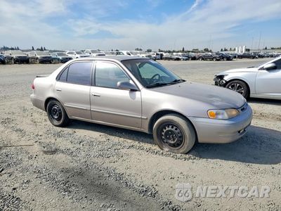 Czwarte zdjęcie samochodu z boku: 1999 TOYOTA COROLLA VE VIN:1NXBR12E9XZ274065 - miniatura