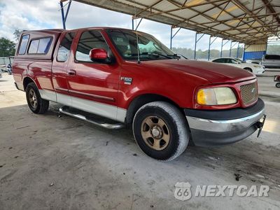 Czwarte zdjęcie samochodu z boku: 2002 FORD F150 VIN:1FTRX17W72NB25750 - miniatura