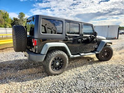 Trzecie zdjęcie samochodu z tyłu: 2011 JEEP WRANGLER UNLIMITED SPORT VIN:1J4HA3H17BL597206 - miniatura