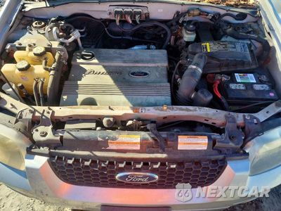 Zdjęcie 12 z 13 samochodu: 2007 FORD ESCAPE HEV VIN:1FMCU49H07KA16095 - miniatura