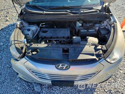 Zdjęcie 12 z 13 samochodu: 2012 HYUNDAI TUCSON GLS VIN:KM8JUCAC9CU372285 - miniatura