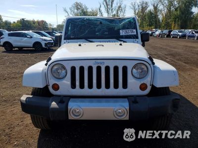 Piąte zdjęcie samochodu w środku: 2013 JEEP WRANGLER SAHARA VIN:1C4AJWBG1DL637935 - miniatura
