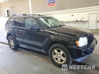 Czwarte zdjęcie samochodu z boku: 2006 JEEP GRAND CHEROKEE LAREDO VIN:1J4HR48N16C220054 - miniatura