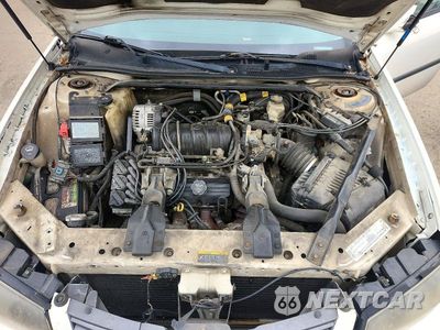Zdjęcie 11 z 12 samochodu: 2003 CHEVROLET IMPALA VIN:2G1WF52K839215746 - miniatura