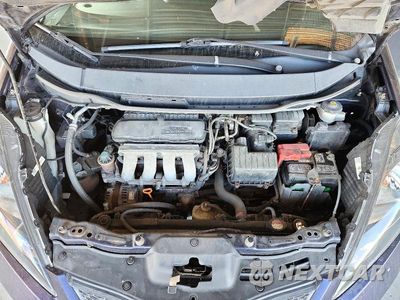 Zdjęcie 11 z 12 samochodu: 2009 HONDA FIT SPORT VIN:JHMGE88409S013109 - miniatura