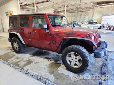 Czwarte zdjęcie samochodu z boku: 2011 JEEP WRANGLER UNLIMITED SPORT VIN:1J4BA3H1XBL552007 - miniatura