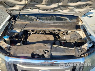 Zdjęcie 12 z 13 samochodu: 2011 HONDA PILOT EXL VIN:5FNYF4H54BB085616 - miniatura