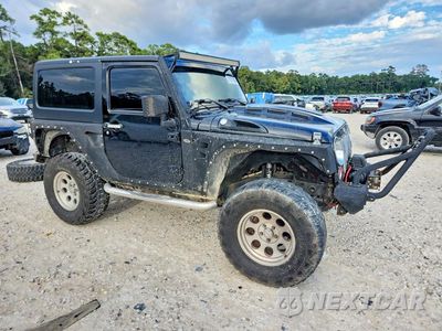 Czwarte zdjęcie samochodu z boku: 2013 JEEP WRANGLER RUBICON VIN:1C4BJWCG5DL601460 - miniatura